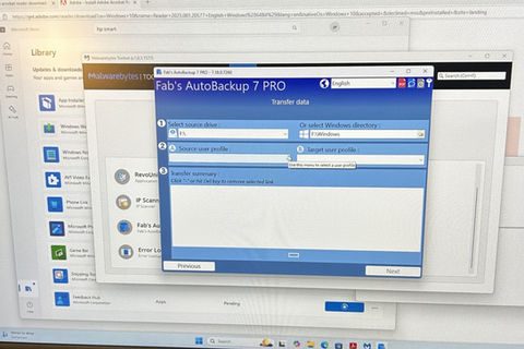 Fab's Autobackup 7 PRO interface on screen with Library options and data transfer.
