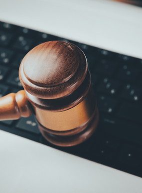 Law gravel on top of laptop IT support that takes confidentiality and deadlines as seriously as you do.