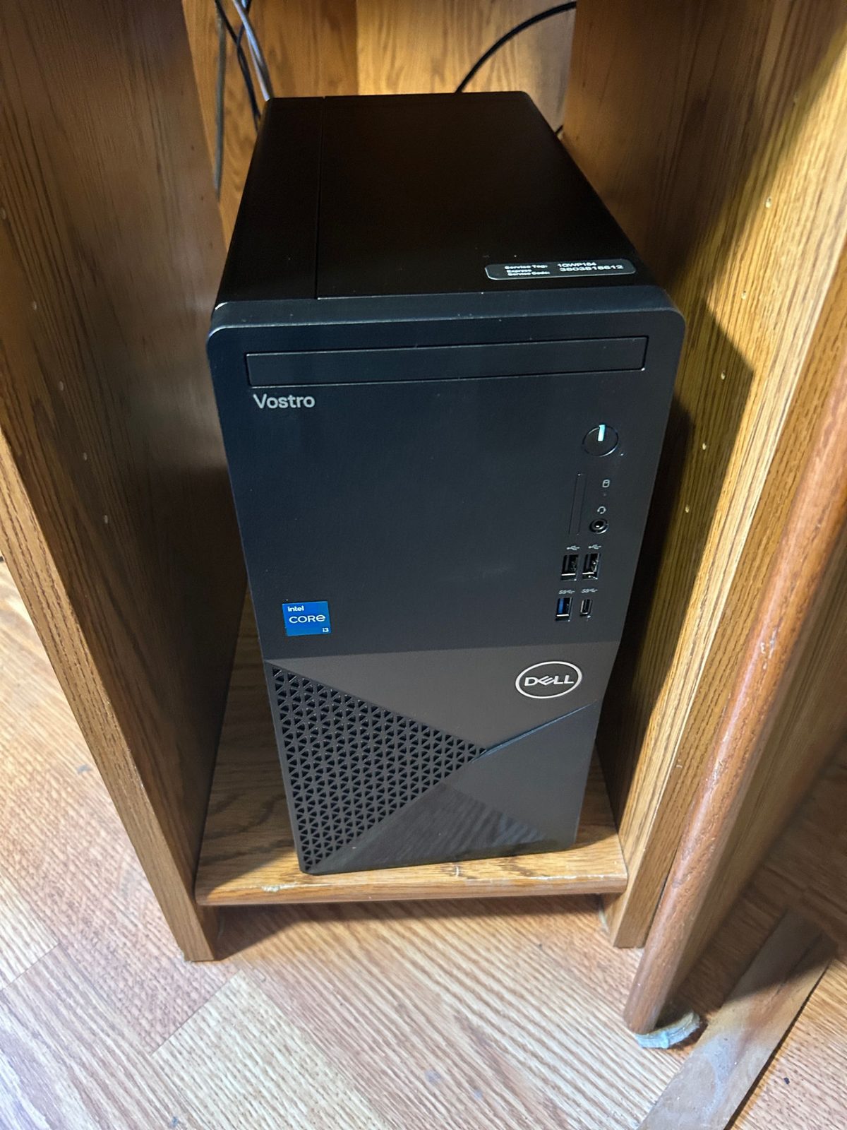 Dell desktop computer in a wooden desk; New Computer Setup with Data Transfer.