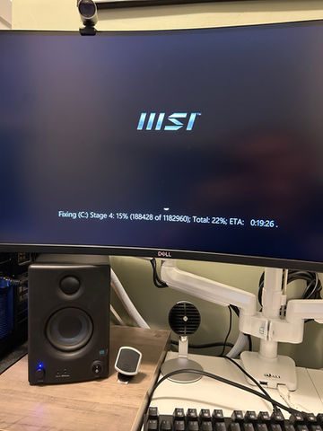 MSI logo on computer monitor displaying startup message Computer Repair Progress