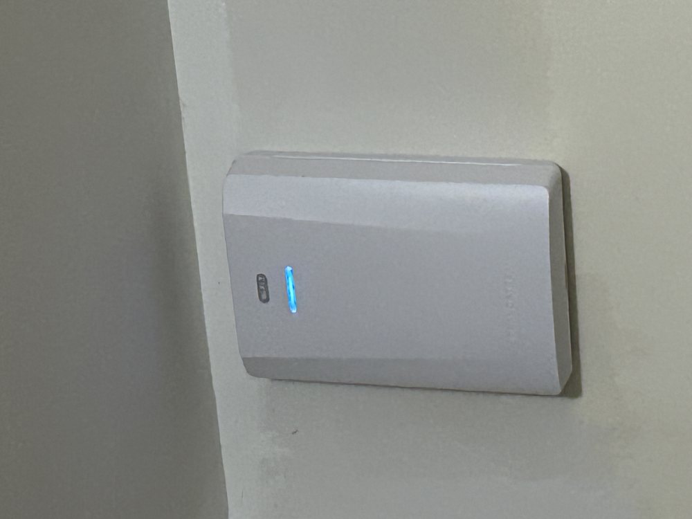 Wall-mounted Wi-Fi access point installation - recent job by Mike Cote Tech LLC